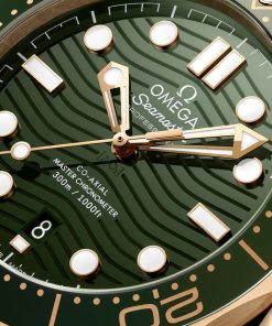 Alternative view of Omega Seamaster Diver 300m 42mm Moonshine Gold Green Dial Rubber Strap 210.62.42.20.10.001